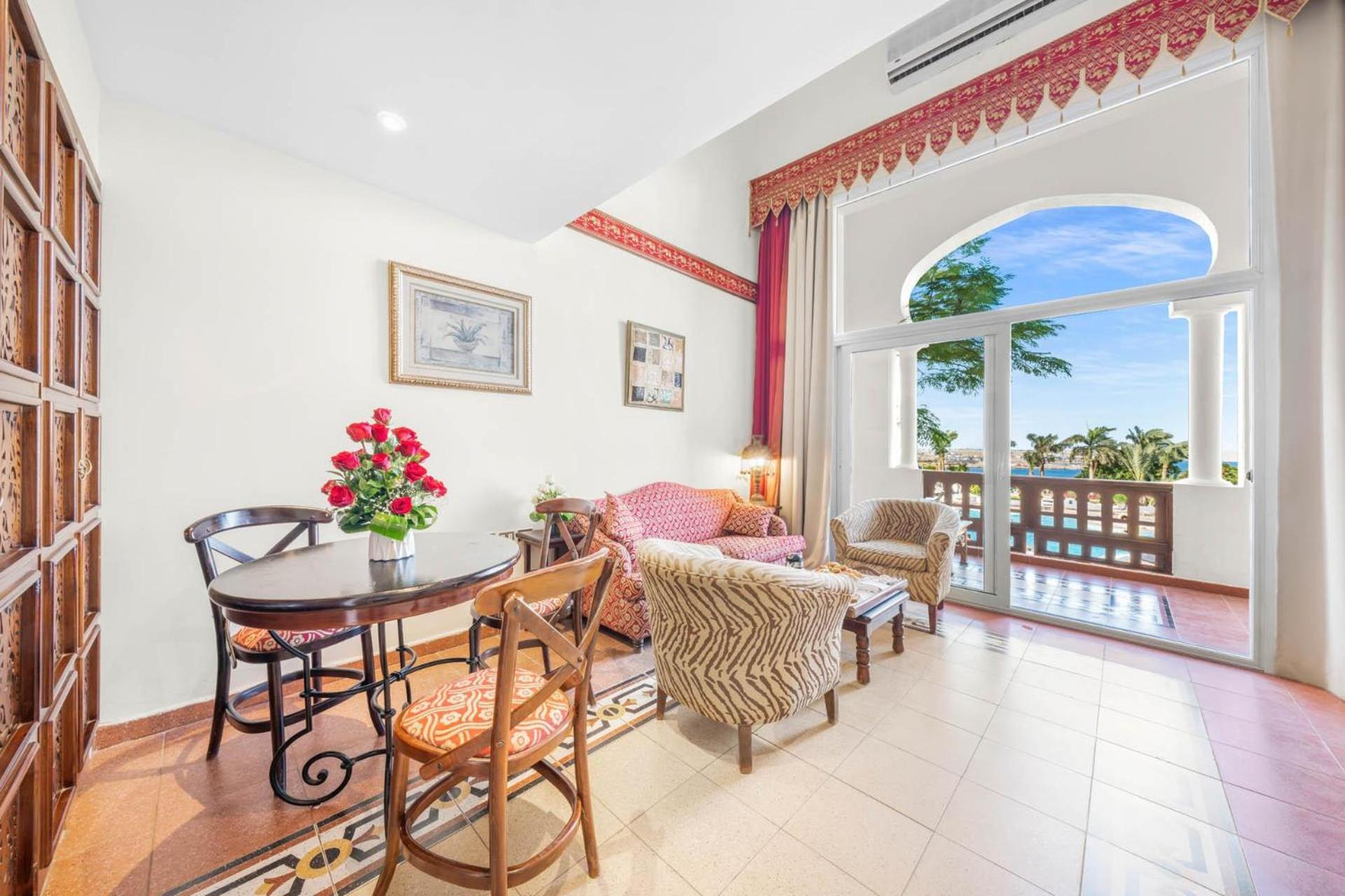 Domina Coral Bay Resort, Diving , Spa & Casino Шарм ел-Шейх Екстериор снимка A typical living room in a condominium